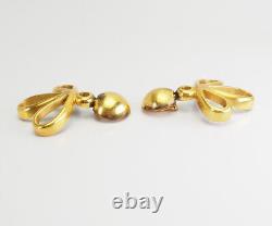 Rare early vintage long gold tone metal clip on earrings by Steve Vaubel 88
