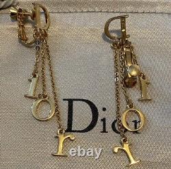 Vintage Christian Dior Gold Logo Screw Clip Earrings