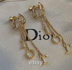Vintage Christian Dior Gold Logo Screw Clip Earrings