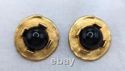 Vintage matte gold clip on earrings with black glass cabochons, 1980s brutalist