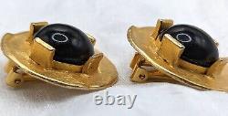 Vintage matte gold clip on earrings with black glass cabochons, 1980s brutalist