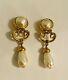 Vintage signed Fendi dangling faux pearl and logo clip earrings